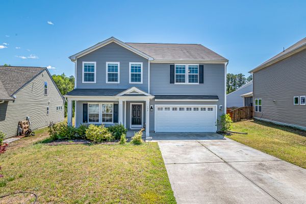 Modern home exterior with landscaped front yard