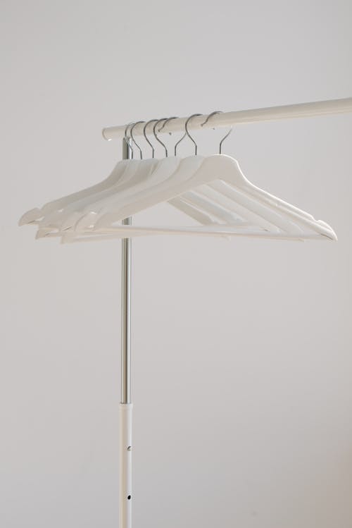Clothes Hangers Hanging on a Clothes Rack