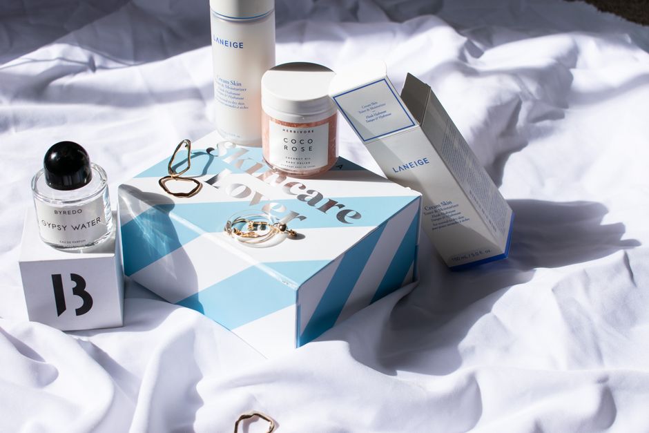 Aesthetic arrangement of skincare items including Laneige and Byredo, captured in natural light. - The Ultimate Guide to Finding Your Perfect Everyday Concealer on Amazon