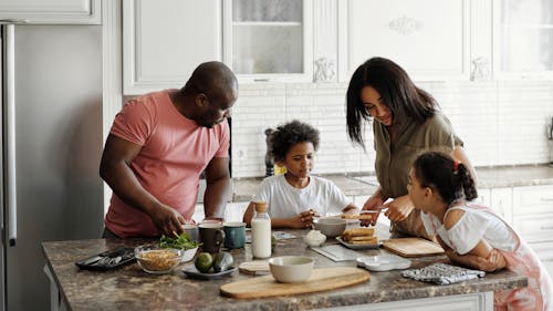 Family Making Breakfast in the Kitchen