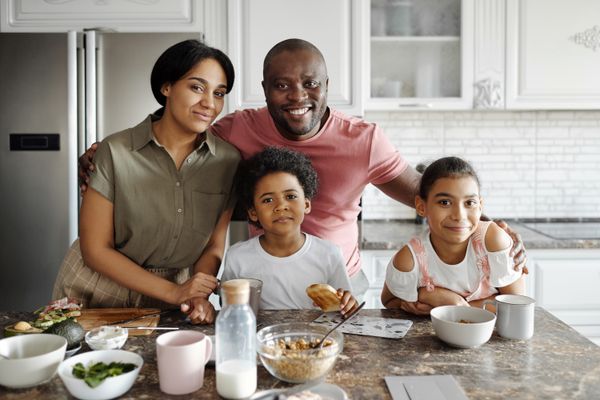 Happy family together in kitchen