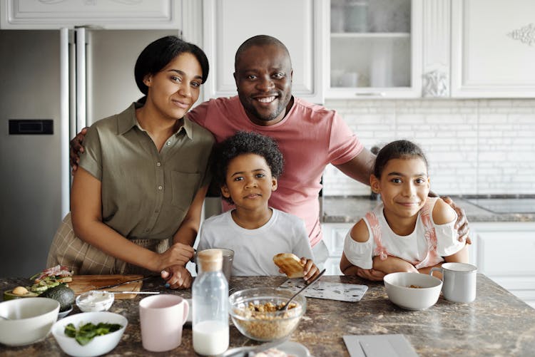 Happy Family In The Kitchen