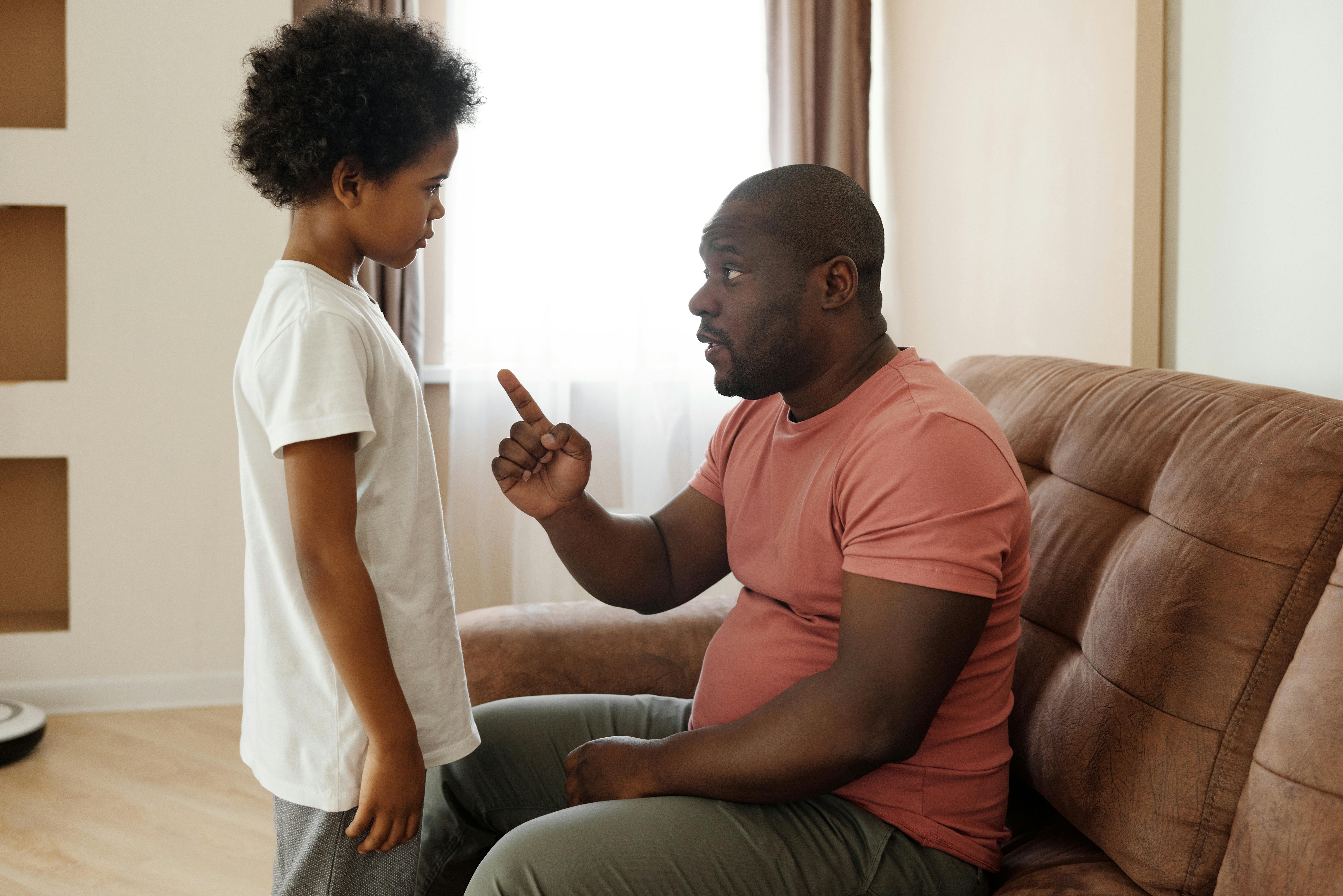 father talking to his son