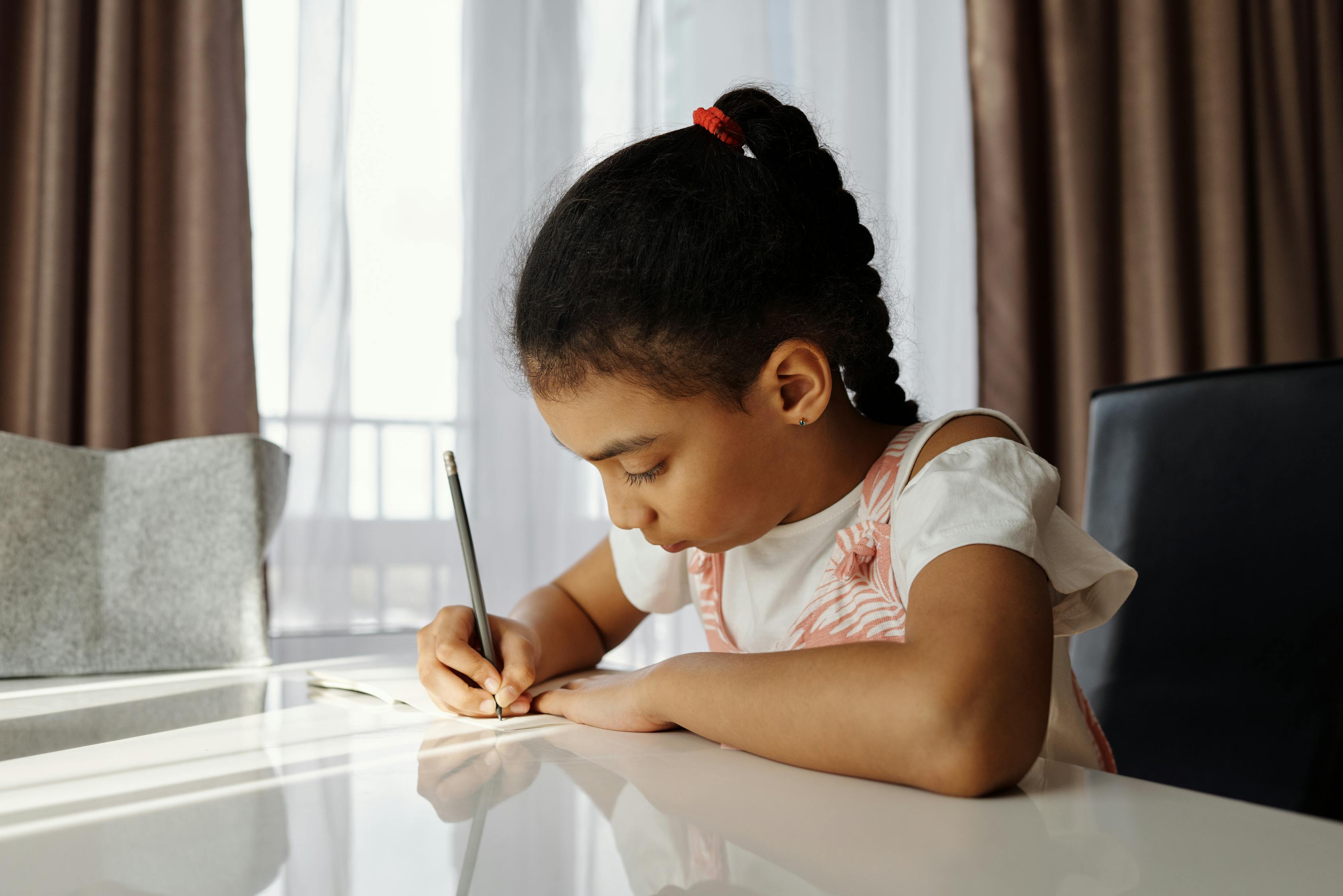 little girl doing homework