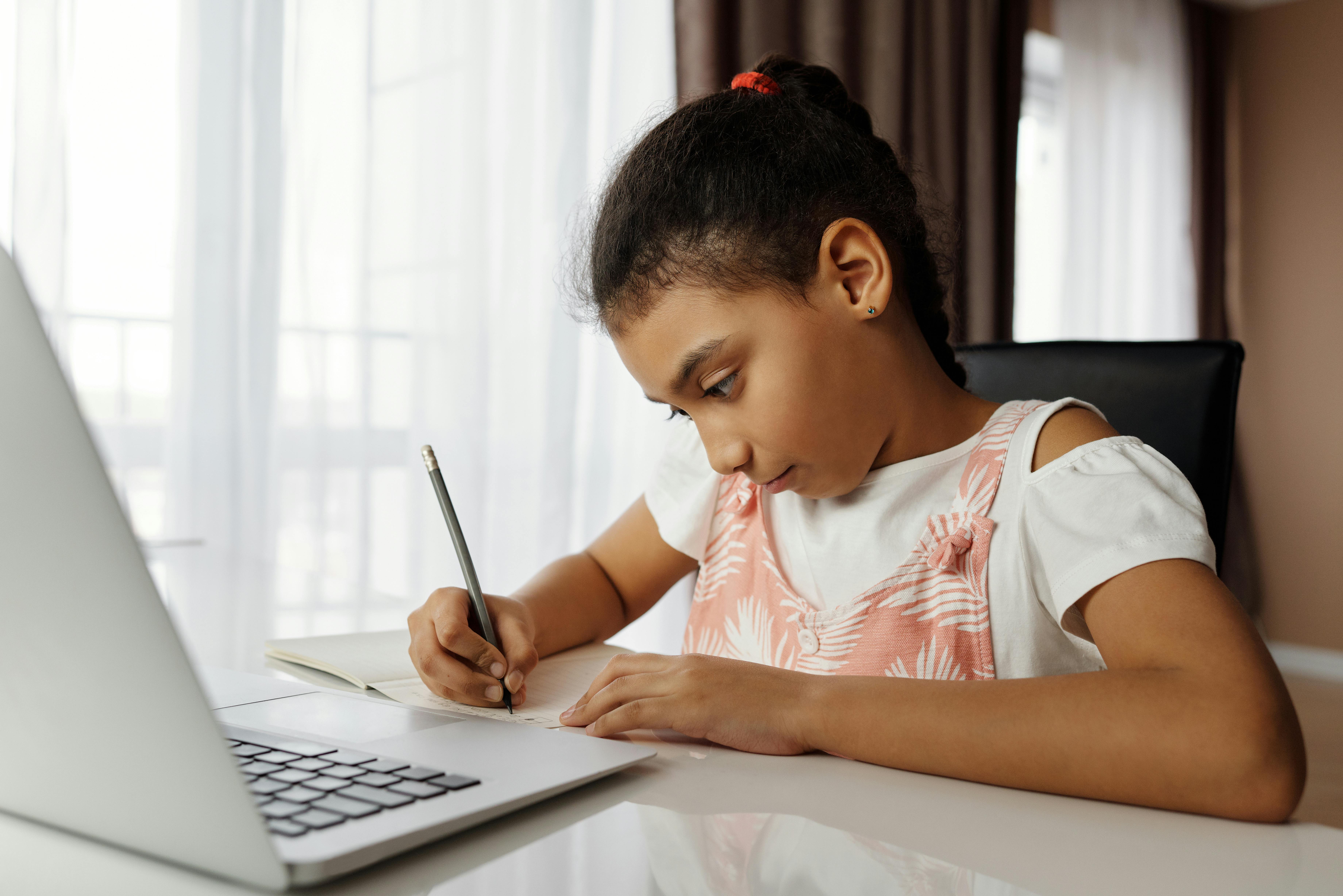 little girl doing her homework