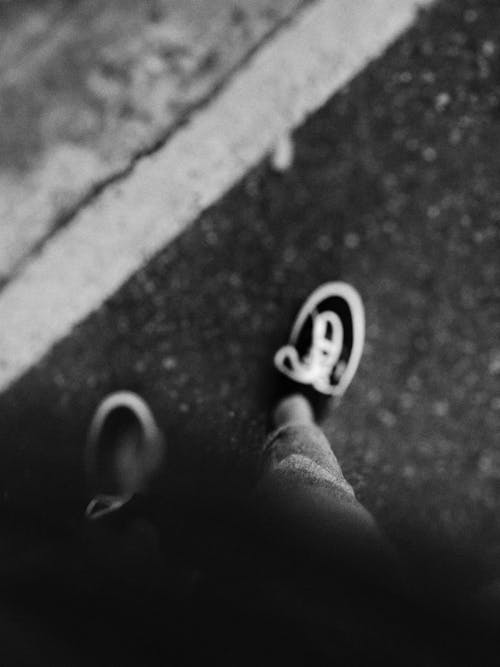 Free Grayscale Photo of a Person's Point of View Looking Down Stock Photo