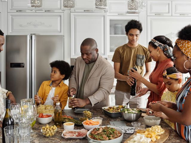 A large family sharing dinner together with their elders