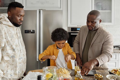 Father and Son Making Dinner