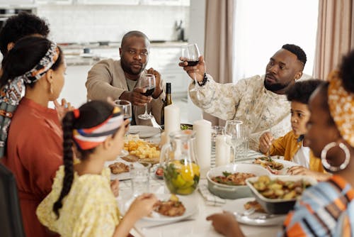 Free Family Having Dinner and Celebrating Stock Photo