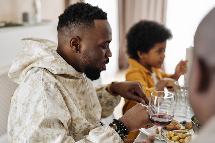 Man Eating With His Family