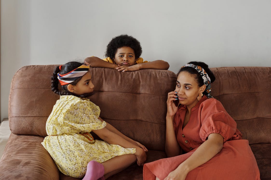 Free Mother and Children on a Sofa Stock Photo