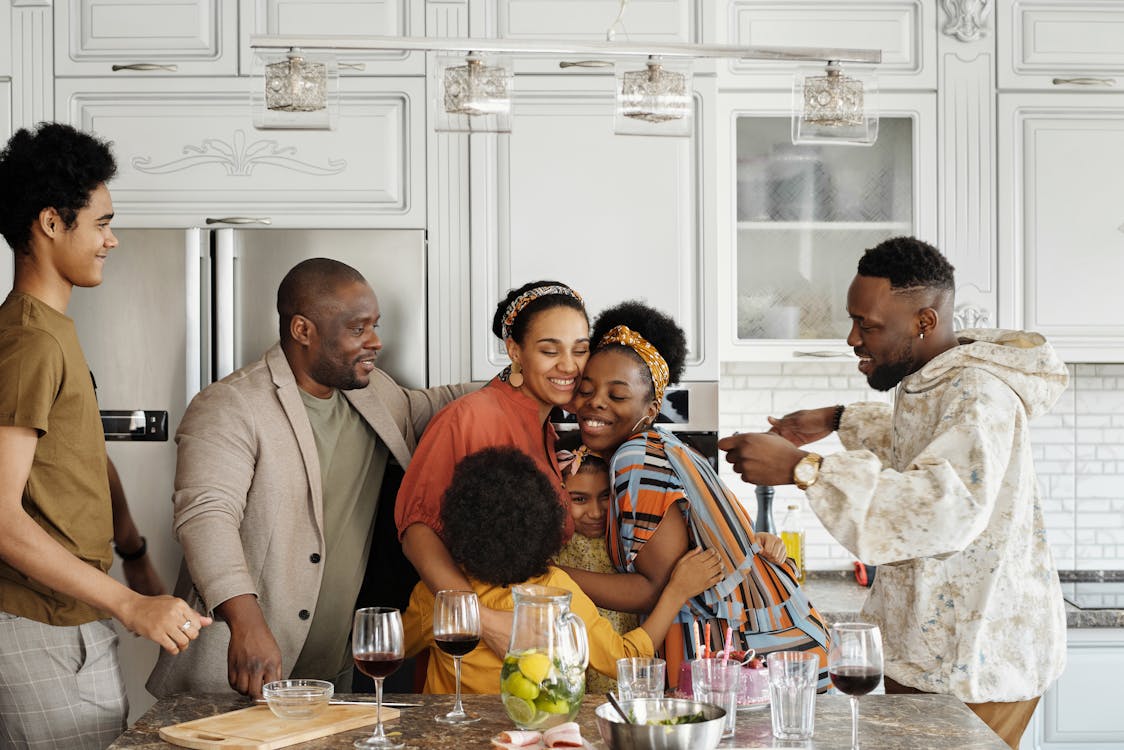 Free Family Gathering for a Group Hug Stock Photo