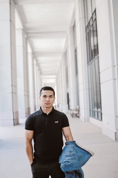 Sporty man in black clothing