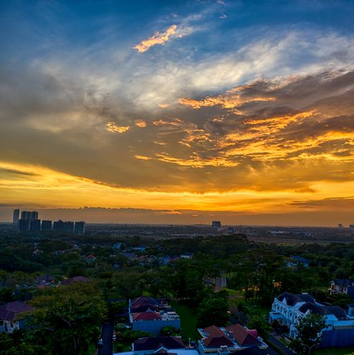 Free Breathtaking view of Banten's cityscape at sunset with vibrant sky colors. Stock Photo