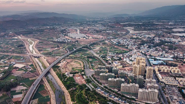 Aerial View Of Small Modern City In Highlands