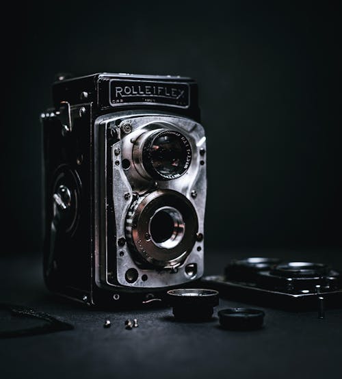 Disassembled retro two lens photo camera