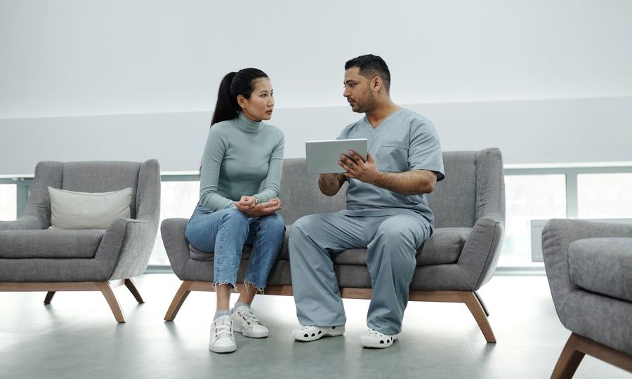 Health care provider consulting with a patient