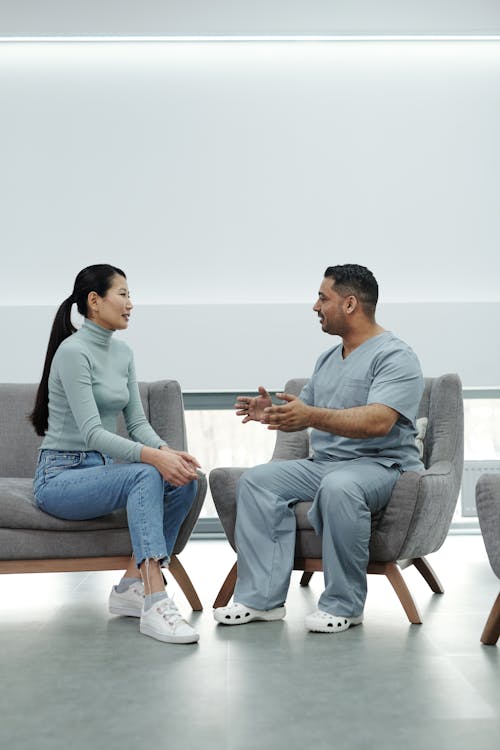 a doctor talking to his patient