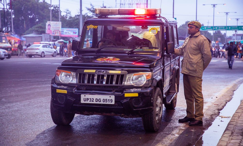 police officer at security checkpoint road