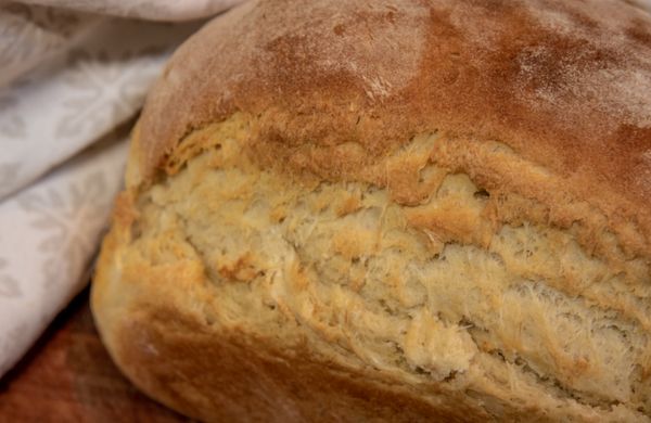 Freshly baked rustic bread loaf close-up