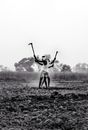 Two Farmers Working On Field