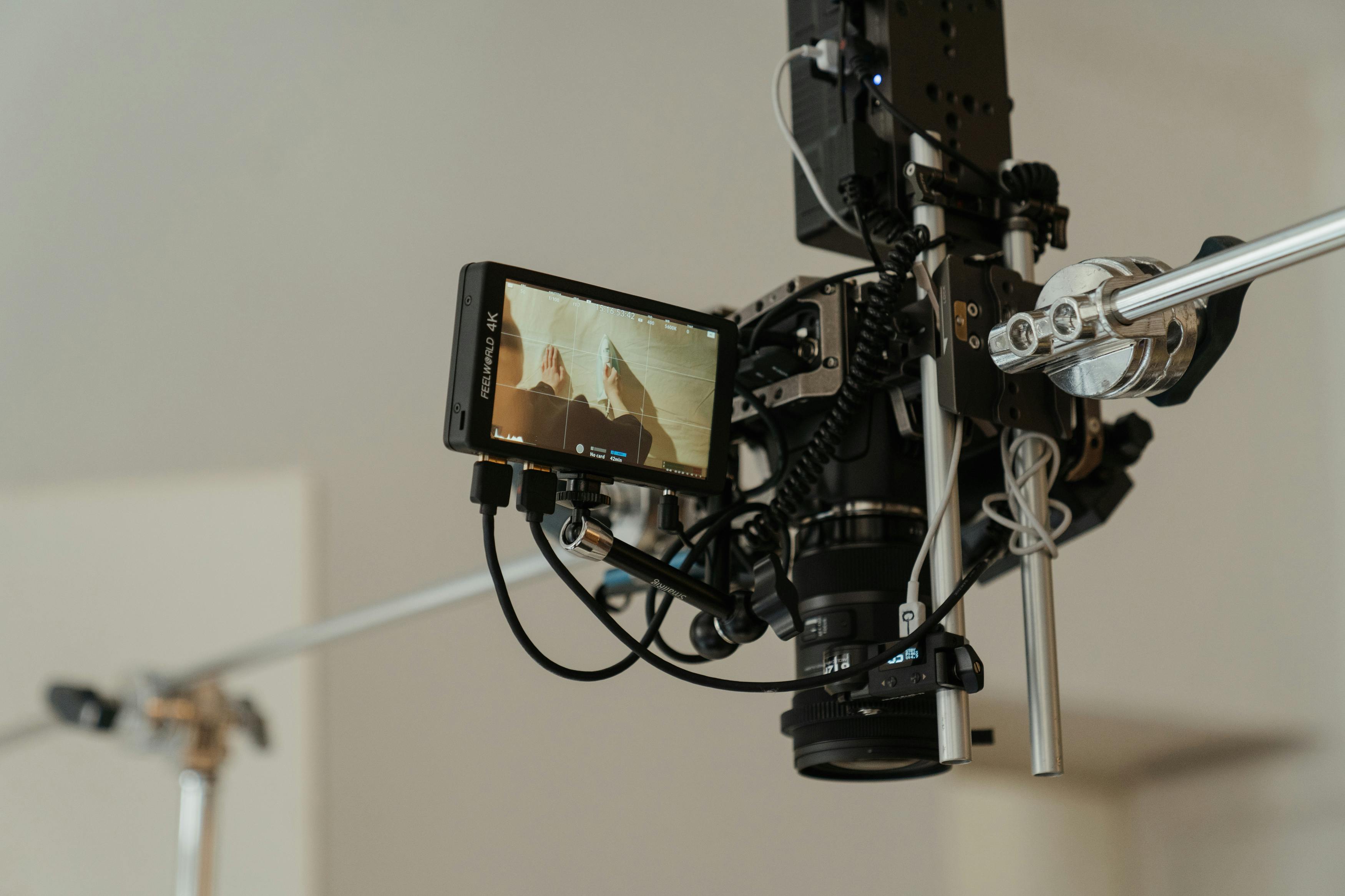 black and silver camera with stand