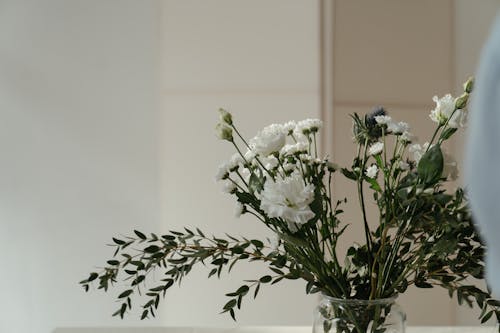 A Floral Arrangement in a Glass Vase