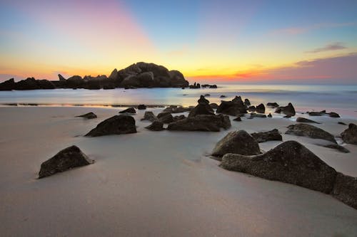 Body of Water Near Rock Formations