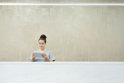 A small business owner reviewing an online booking calendar synced with their tools