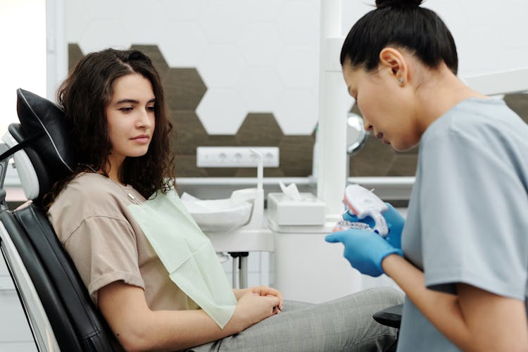 Dentist With Patient