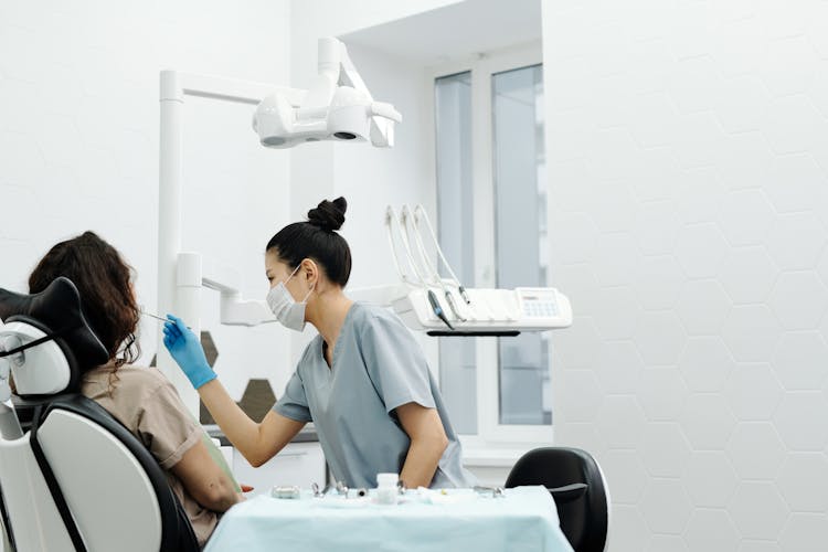 Dentist With A Patient 