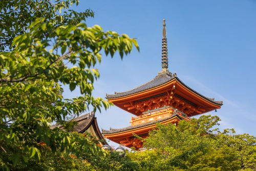 Free Beautiful view of Koyasu Pagoda surrounded by greenery and clear blue sky in Kyoto, Japan. Stock Photo