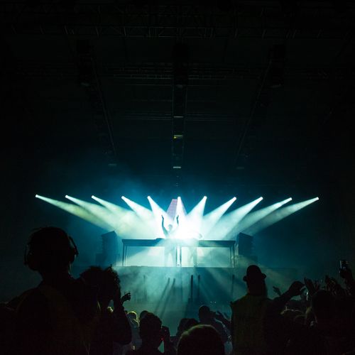 Club dancefloor under laser lighting — photo by Jacob Morch on Pexels