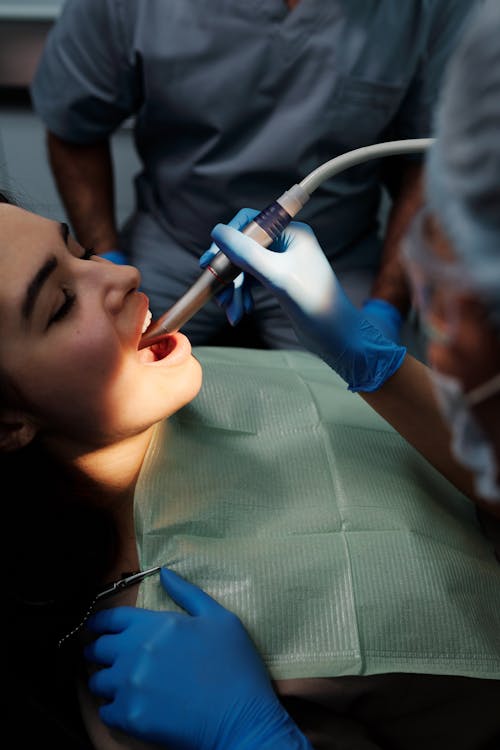Free Close-Up Shot of Woman Having a Dental Treatment Stock Photo