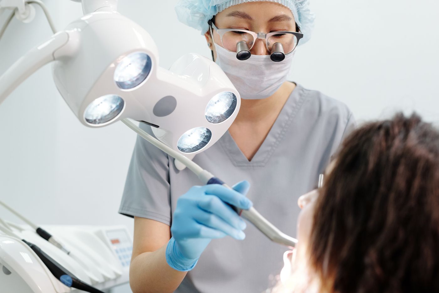 Licensed dentist providing regulated clinical dental care