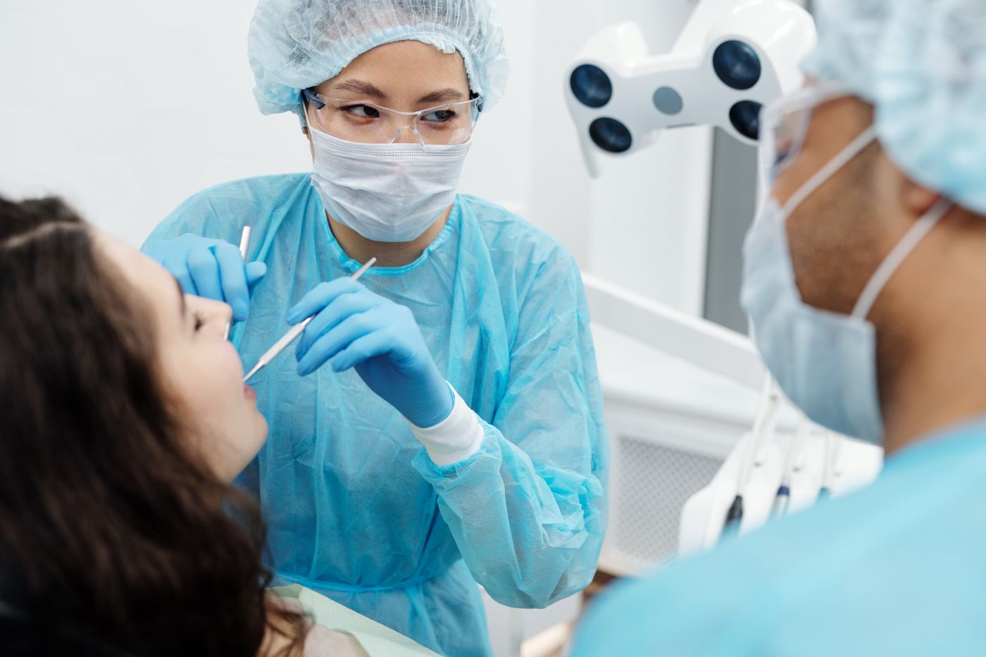 Dentist checking a patient's teeth
