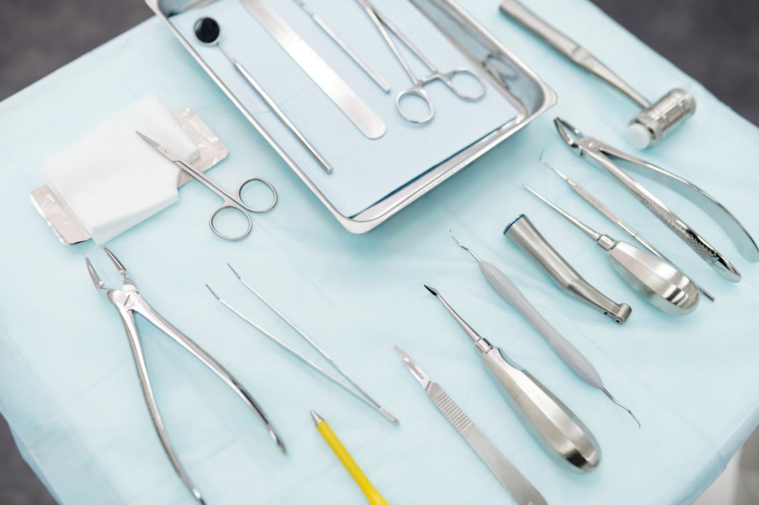 Sterile dental instruments on a clinical tray