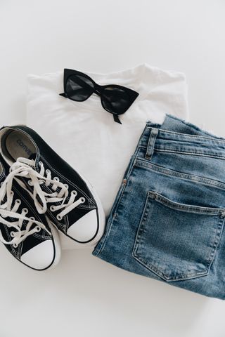 Neutral-toned clothing flat lay — photo by alleksana on Pexels