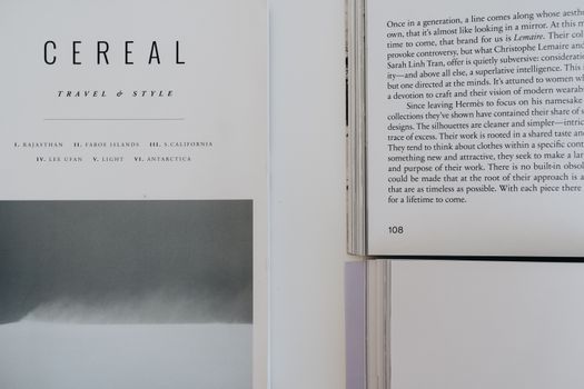 Close-up of open Cereal magazine showcasing travel and style content.