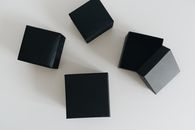 A Flatlay of Black Boxes
