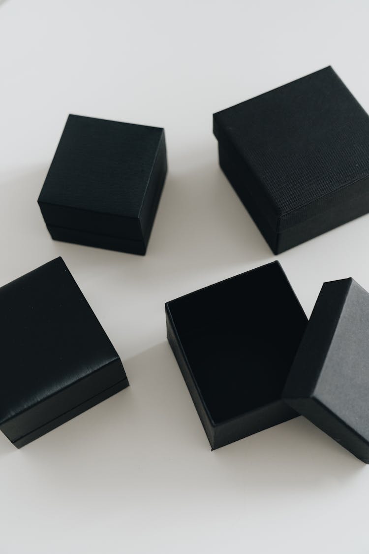 Vertical Shot Of Black Empty Jewelry Boxes