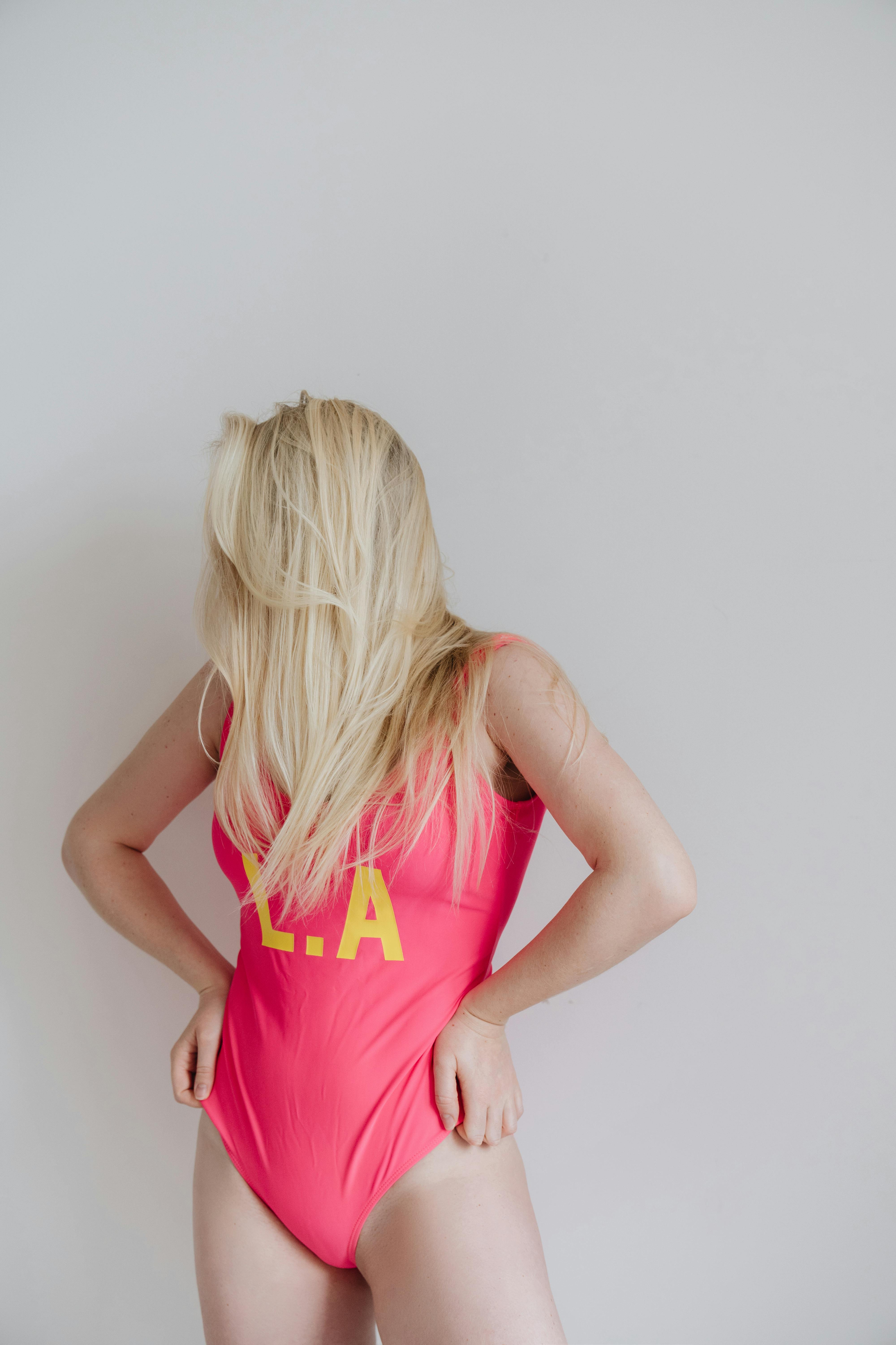 Woman in Pink Swimsuit · Free Stock Photo