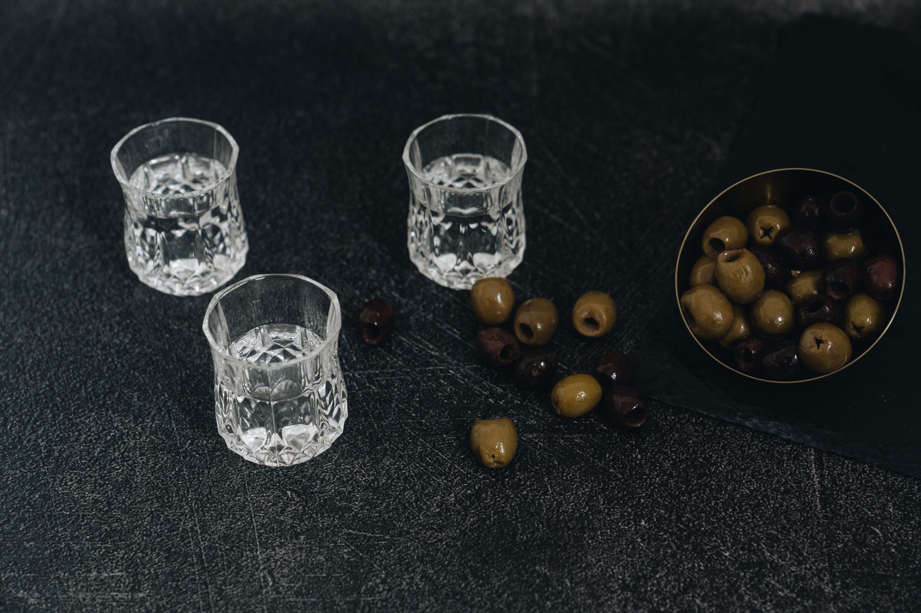 Black vodka cocktails beautifully garnished and served in clear glasses