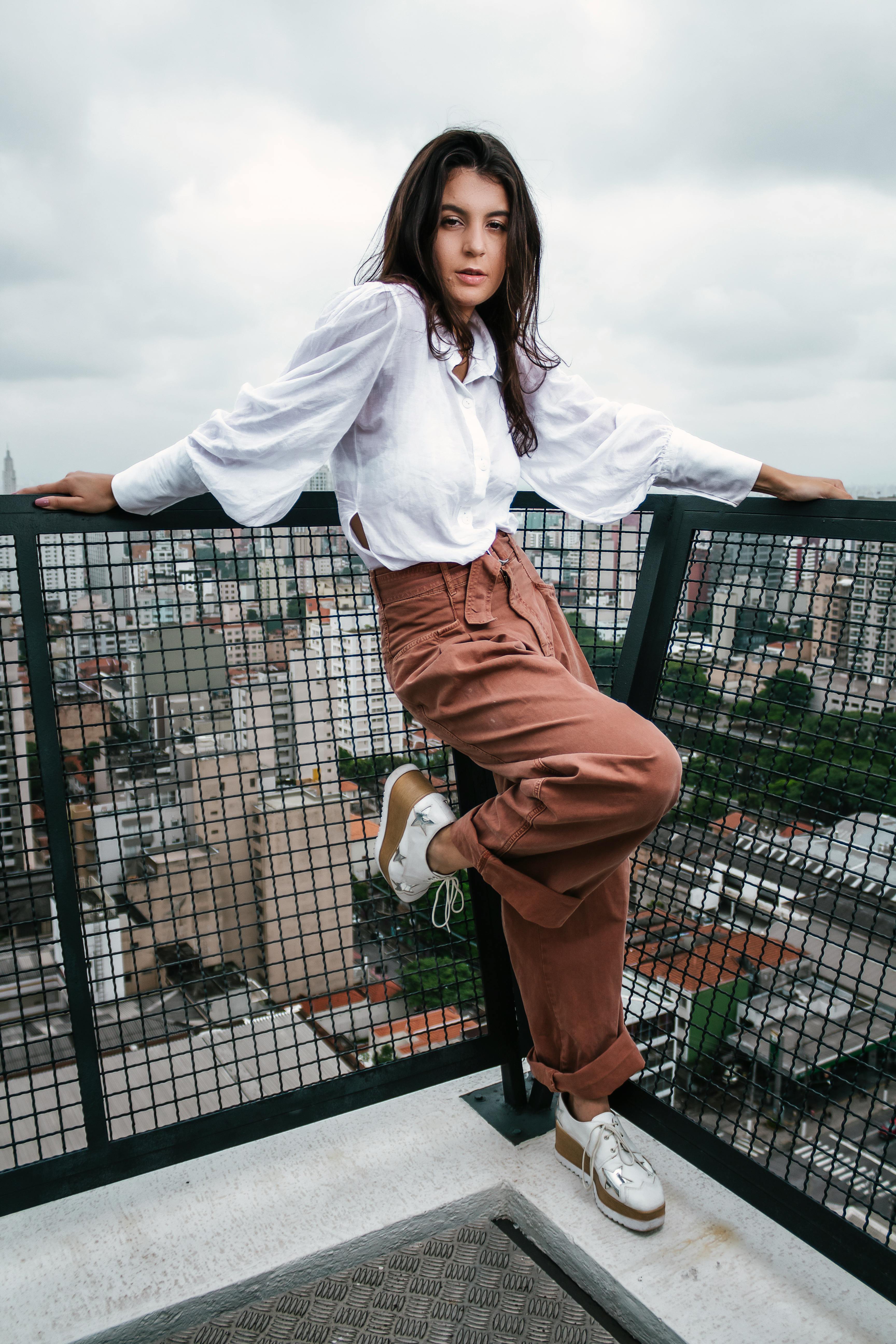 white long sleeve brown pants