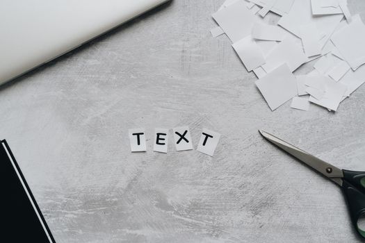 Text Word in White Pieces of Paper