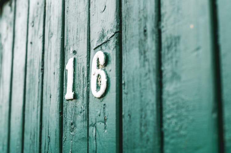 Photo Of Number 16 On Green Wooden Wall