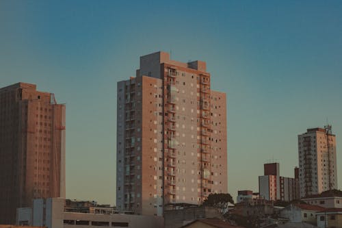 Brown Concrete Building Under Blue Sky