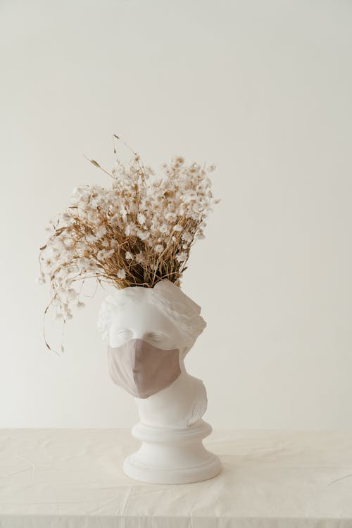 Dried Wildflowers Many Tiny Blue And Yellow Flowers In A Transparent Glassy  Vase Bouquet On A Gray Background Stock Photo - Download Image Now - iStock