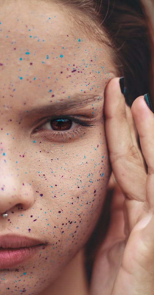 Photo of Person's Face With Paint