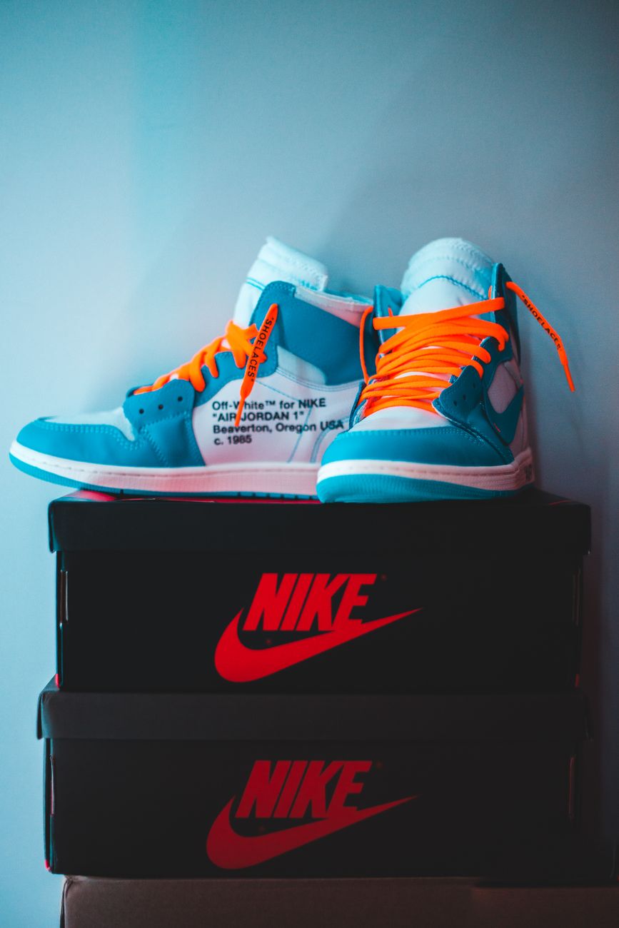Colorful High Top Sneakers Orange Laces Stacked